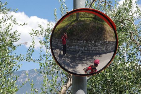 Laura and I reflected in a mirror along the road