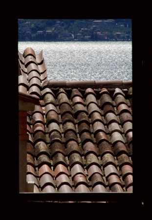 view of the lake through a window in the nursery garden