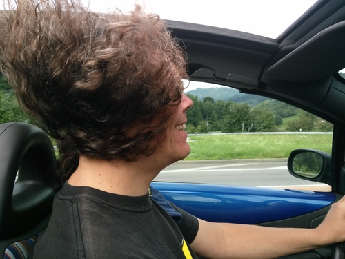 hair blows through sunroof